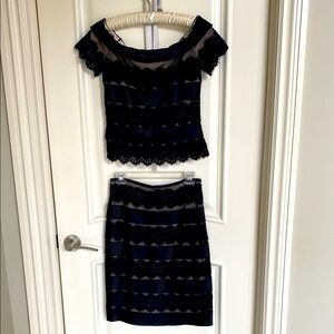 Elegant Black Lace Top and Skirt Set with a beige lining.